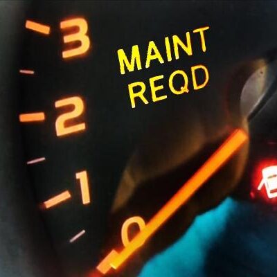 MAINT REQD on a tachometer gauge bacground